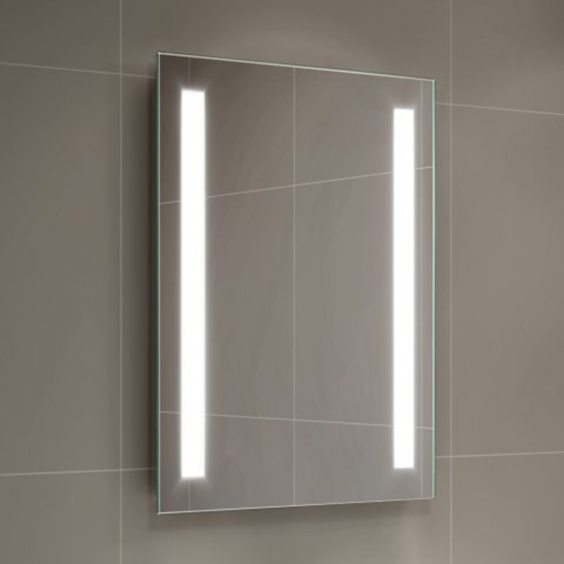 (T128) 500x700mm Omega LED Mirror - Battery Operated Our ultra-flattering LED Battery Operated