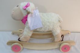 BRAND NEW ROCKING SHEEP WITH WHEELS