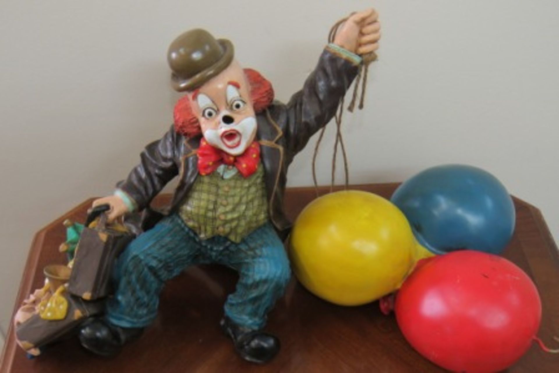 Cast Resin Clown Holding Balloons
