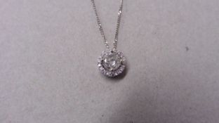 0.50ct diamond set pendant. Brilliant cut diamond H colour, VS clarity. Halo setting with diamonds