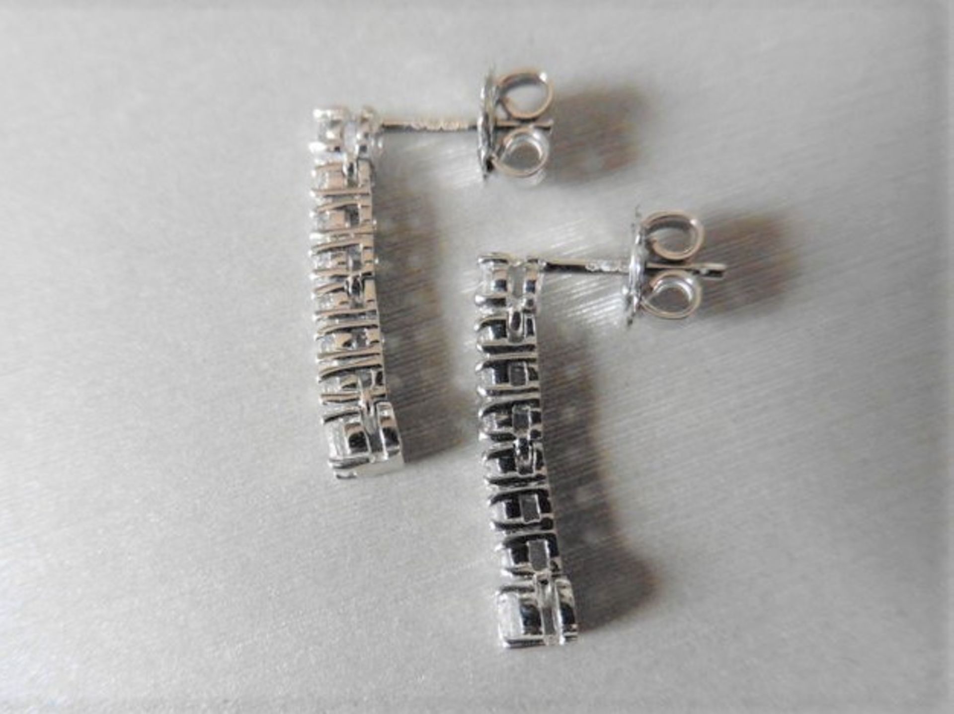 0.62ct diamond drop earrings set in 18ct white gold. Brilliant cut diamonds, I colour and Si3 - Image 2 of 2