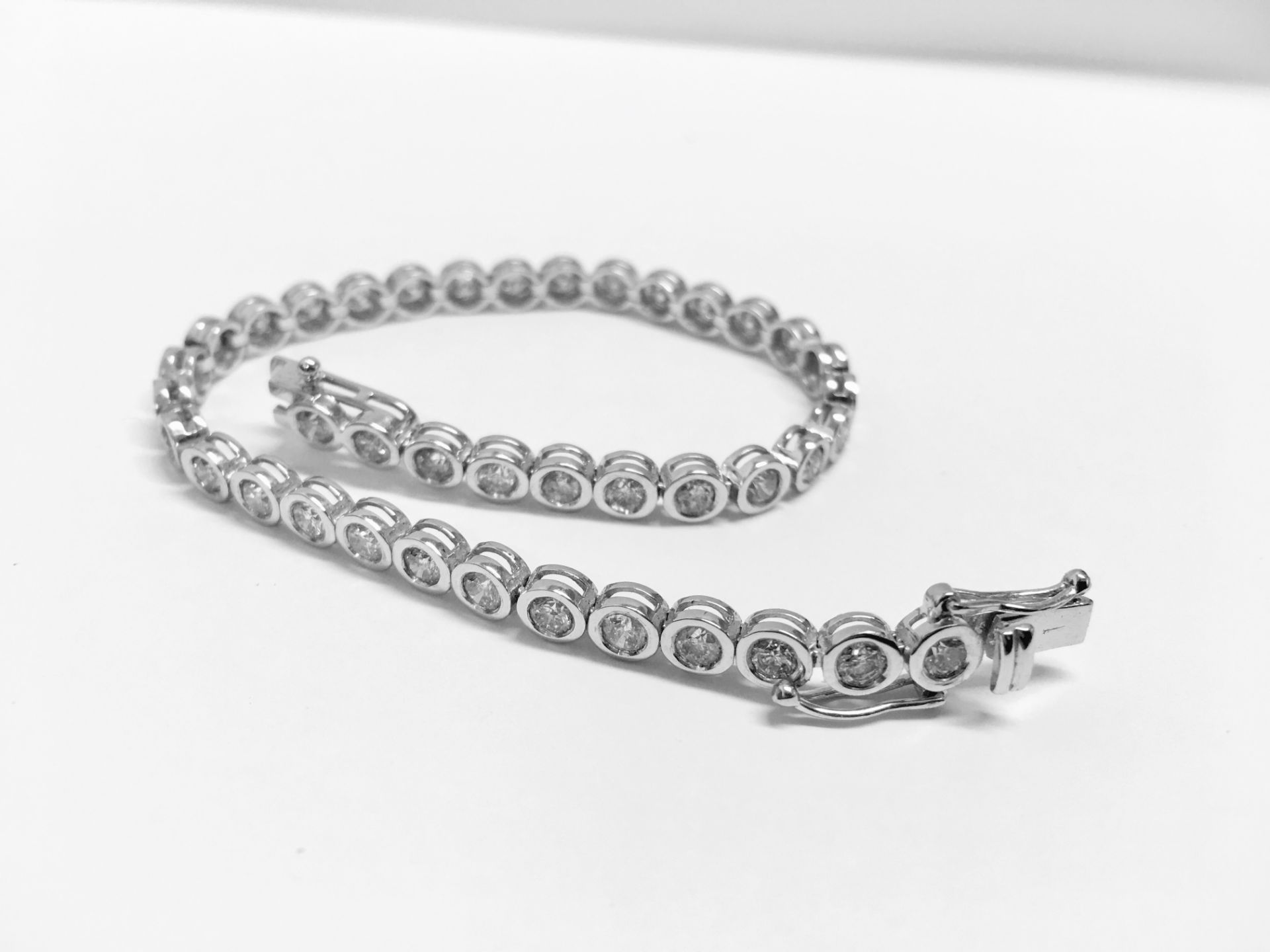 5.60ct diamond tennis style bracelet set with brilliant cut diamonds, I colour, Si2 clarity. 18ct - Bild 7 aus 7