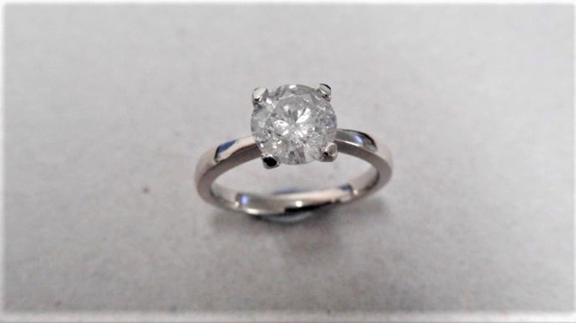 1.72ct diamond solitaire ring set in 18ct white gold. I colour and I2 clarity. 4 claw setting.