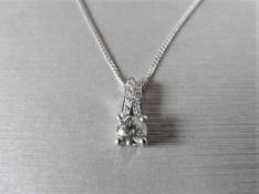 0.70ct Diamond set pendant with a brilliant cut diamond, I colour, i1 clarity. The bale is diamond