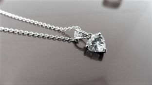 0.93ct diamond pendant set in 18ct white gold. 0.93ct heart shaped diamond, K colour and I1 clarity.