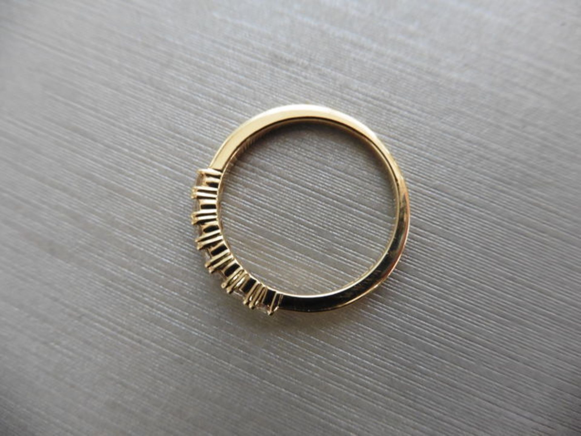 0.42ct diamond band ring set in 9ct yellow gold. 7 Small brilliant cut diamonds, I colour and i1 - Bild 3 aus 3