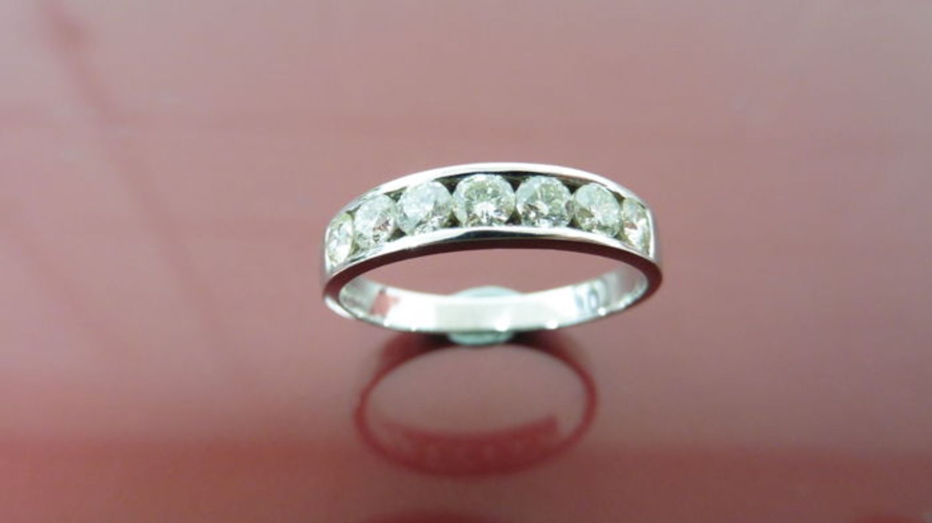 0.70ct diamond eternity band ring set in 9ct white gold. 7 brilliant cut diamonds, I colour, si3