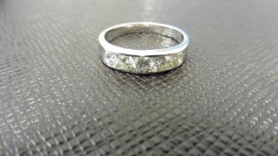 1.25ct diamond band ring. 5 brilliant cut diamonds, I colour and si3 clarity. Channel setting set in