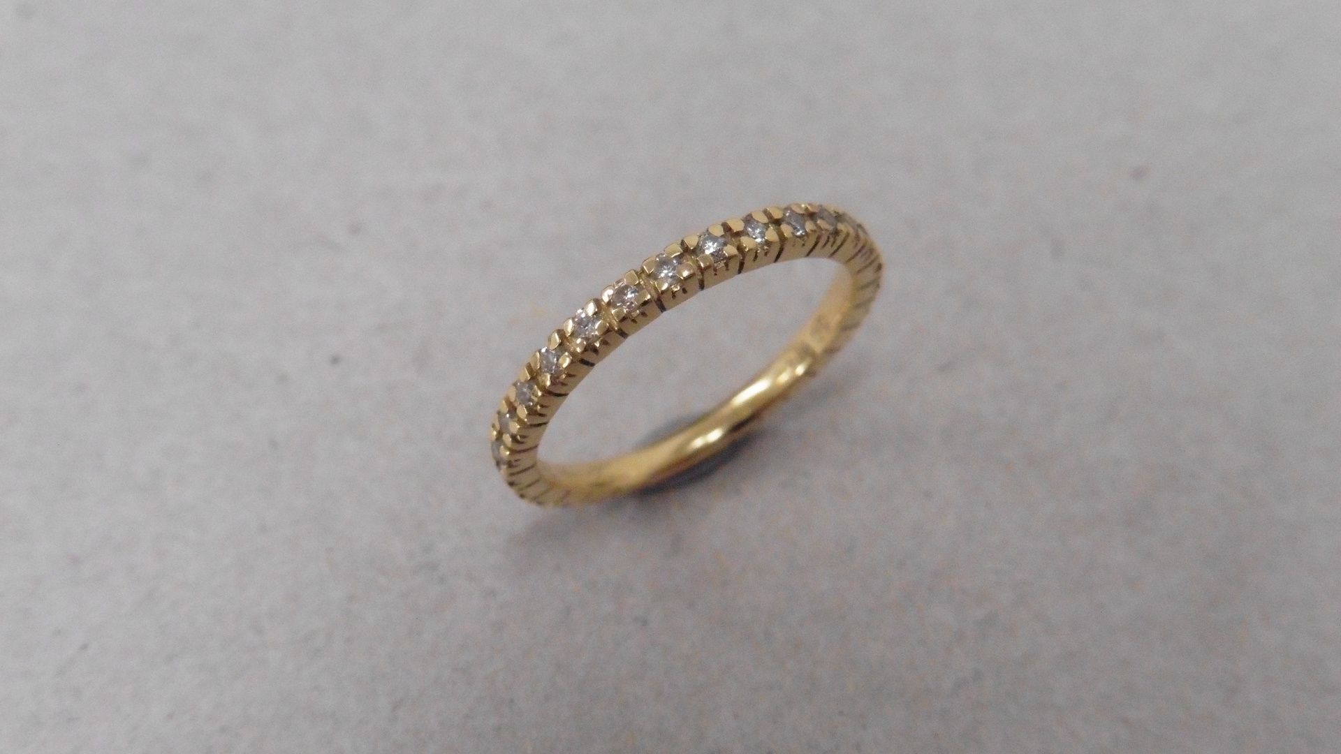 Diamond set band ring set in 18ct yellow gold. Brilliant cut diamonds set all the way round weighing - Image 3 of 3