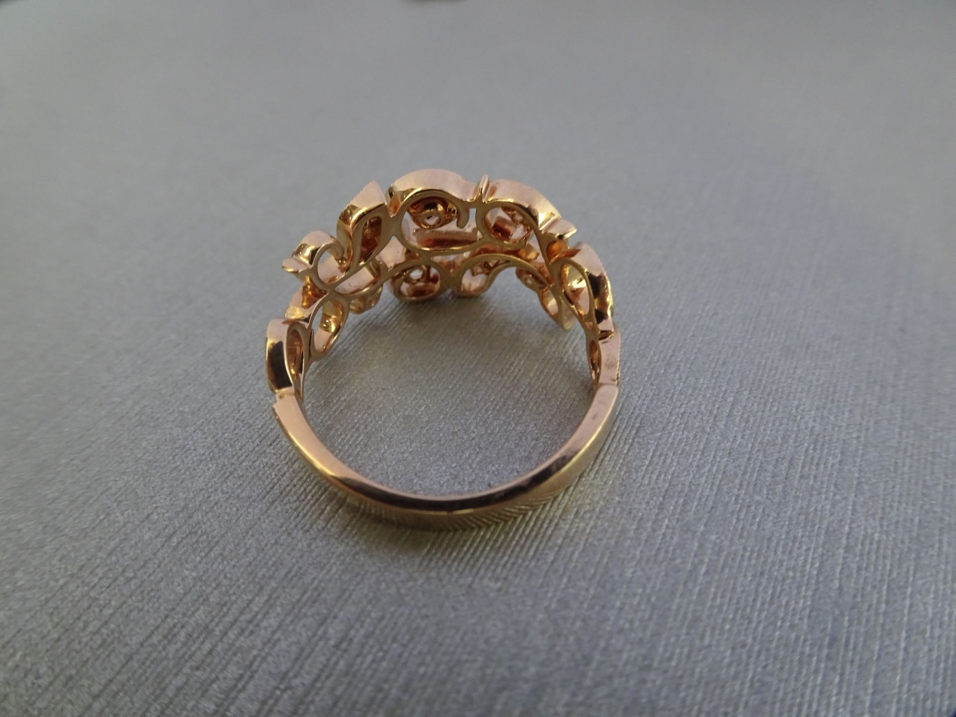 14ct rose gold open diamond dress ring. Set with graduated Brilliant cut diamonds, of H colour and - Image 2 of 3