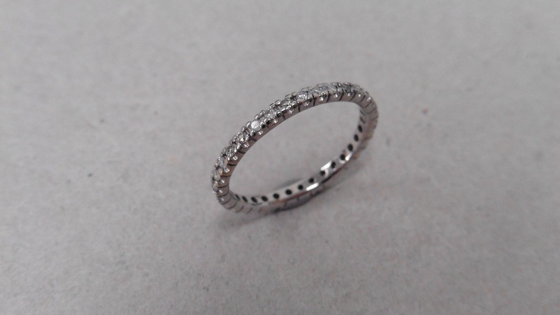 0.26ct diamond set band ring. Brilliant cut diamonds set all the way round in a micro claw
