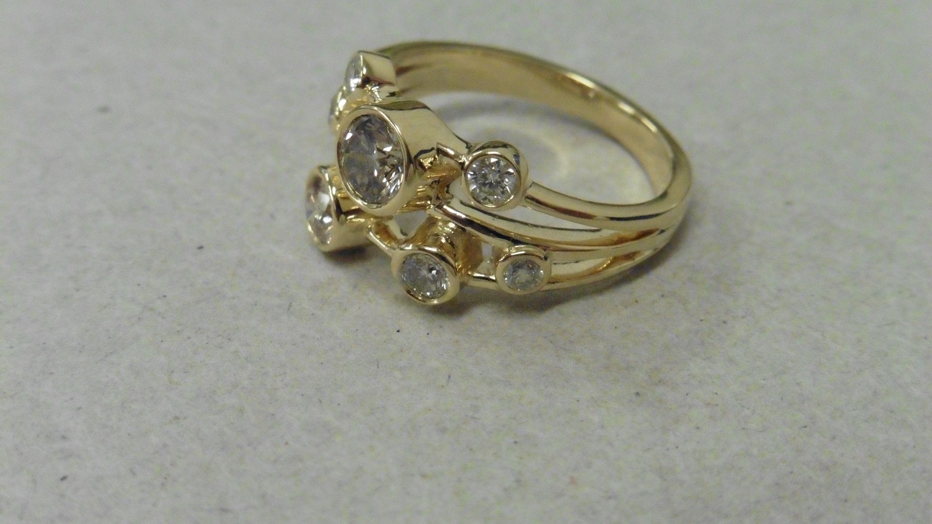 1.00ct diamond dress ring set in 9ct yellow gold. Graduated brilliant cut diamonds, I/J colour and - Image 2 of 3