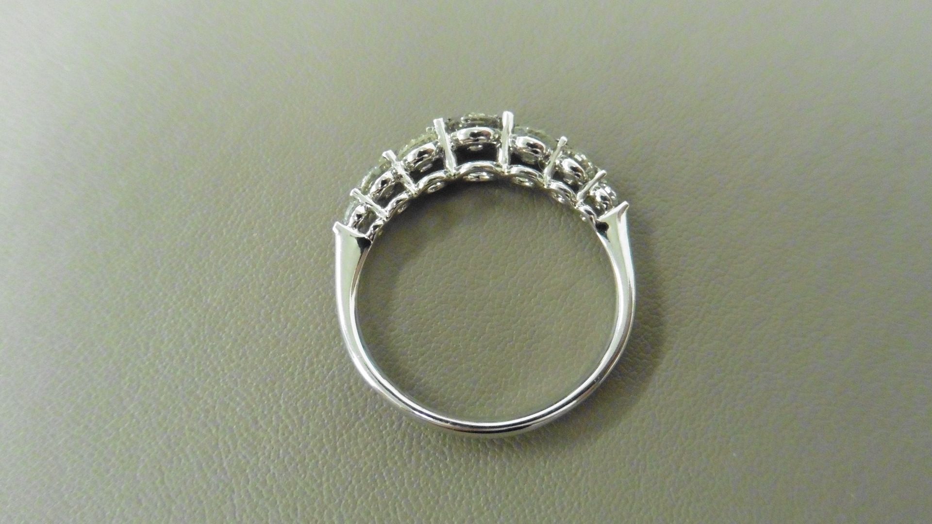 0.60ct diamond band ring set in 14ct white gold. 7 graduated brilliant cut diamonds, I colour and - Bild 2 aus 3
