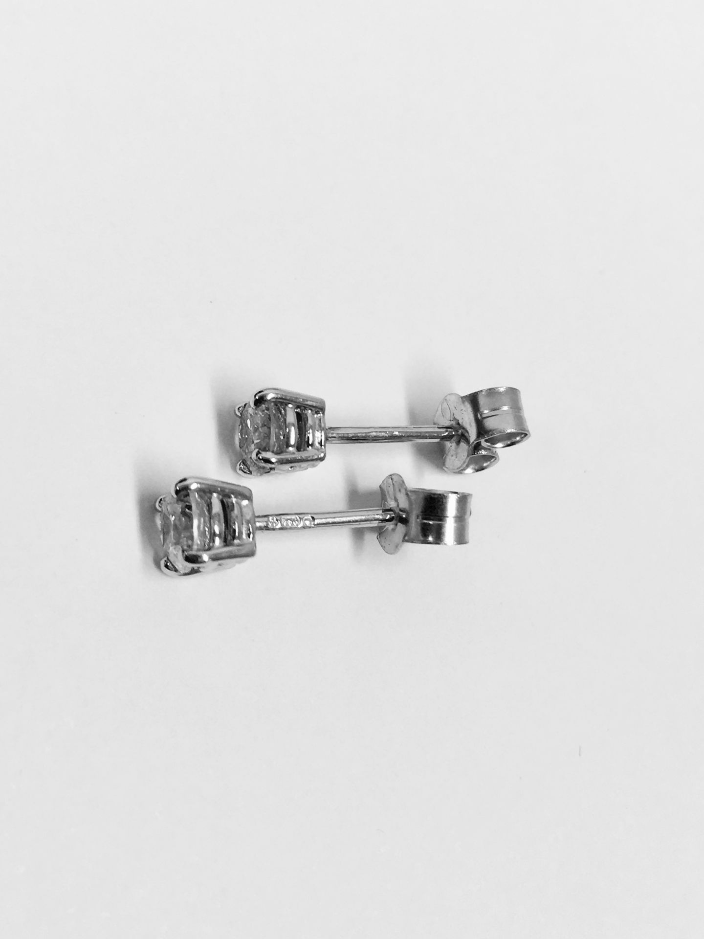 0.66ct Solitaire diamond stud earrings set with brilliant cut diamonds, SI2 clarity and I colour. - Image 2 of 3