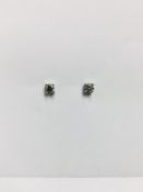 0.30ct Solitaire diamond stud earrings set with brilliant cut diamonds, SI2 clarity and I colour.