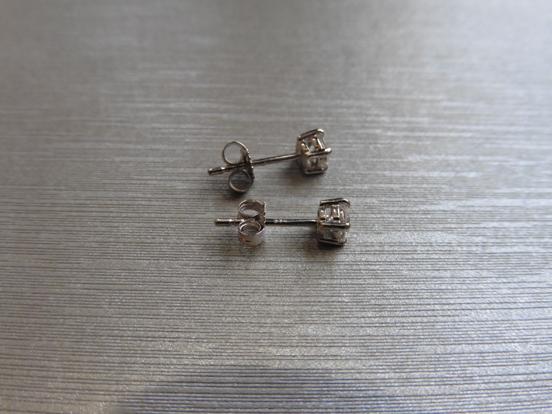 0.60ct Solitaire diamond stud earrings set with brilliant cut diamonds, SI2 clarity and I colour. - Image 3 of 4