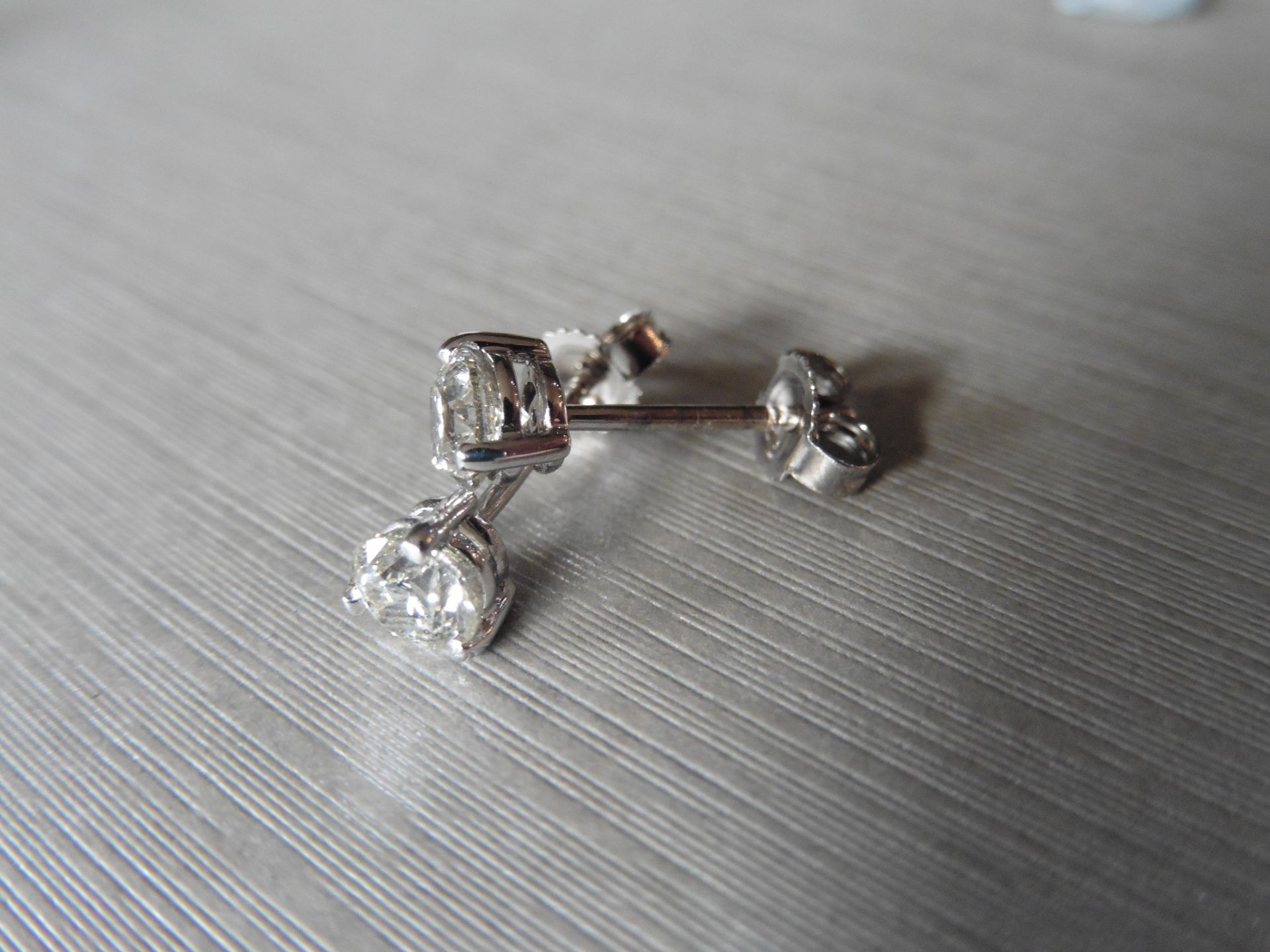 1.00ct Diamond solitaire earrings set with brilliant cut diamonds, I colour SI2 clarity. Six claw - Image 2 of 2