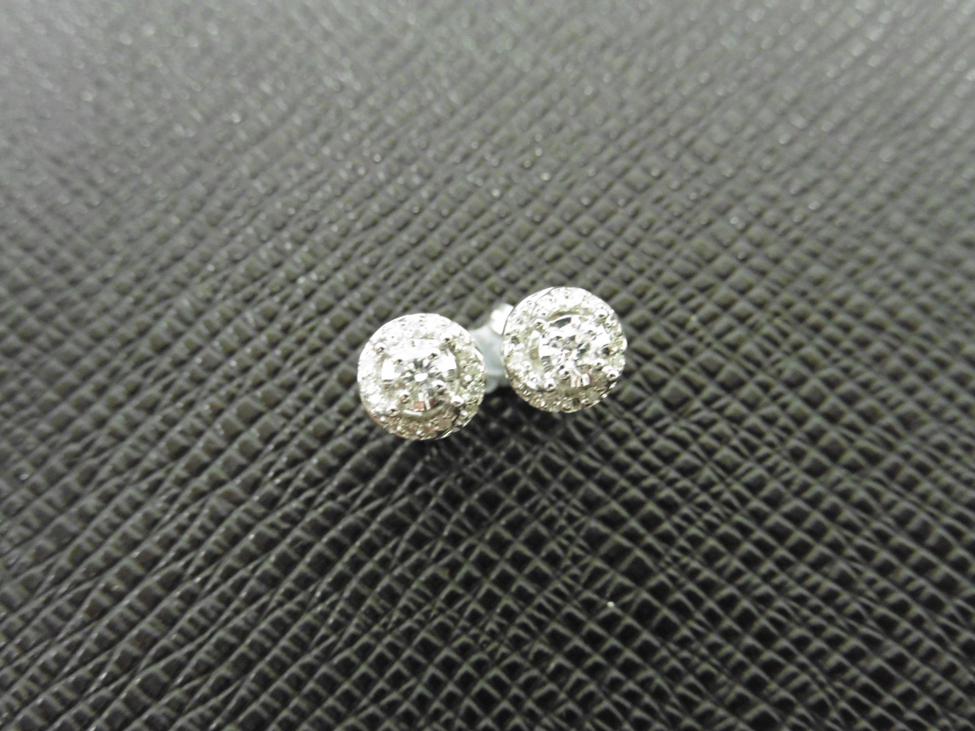 0.25ct diamond set stud earrings in 9ct white gold. Small brilliant cut diamonds. H colour and I1- - Bild 2 aus 3