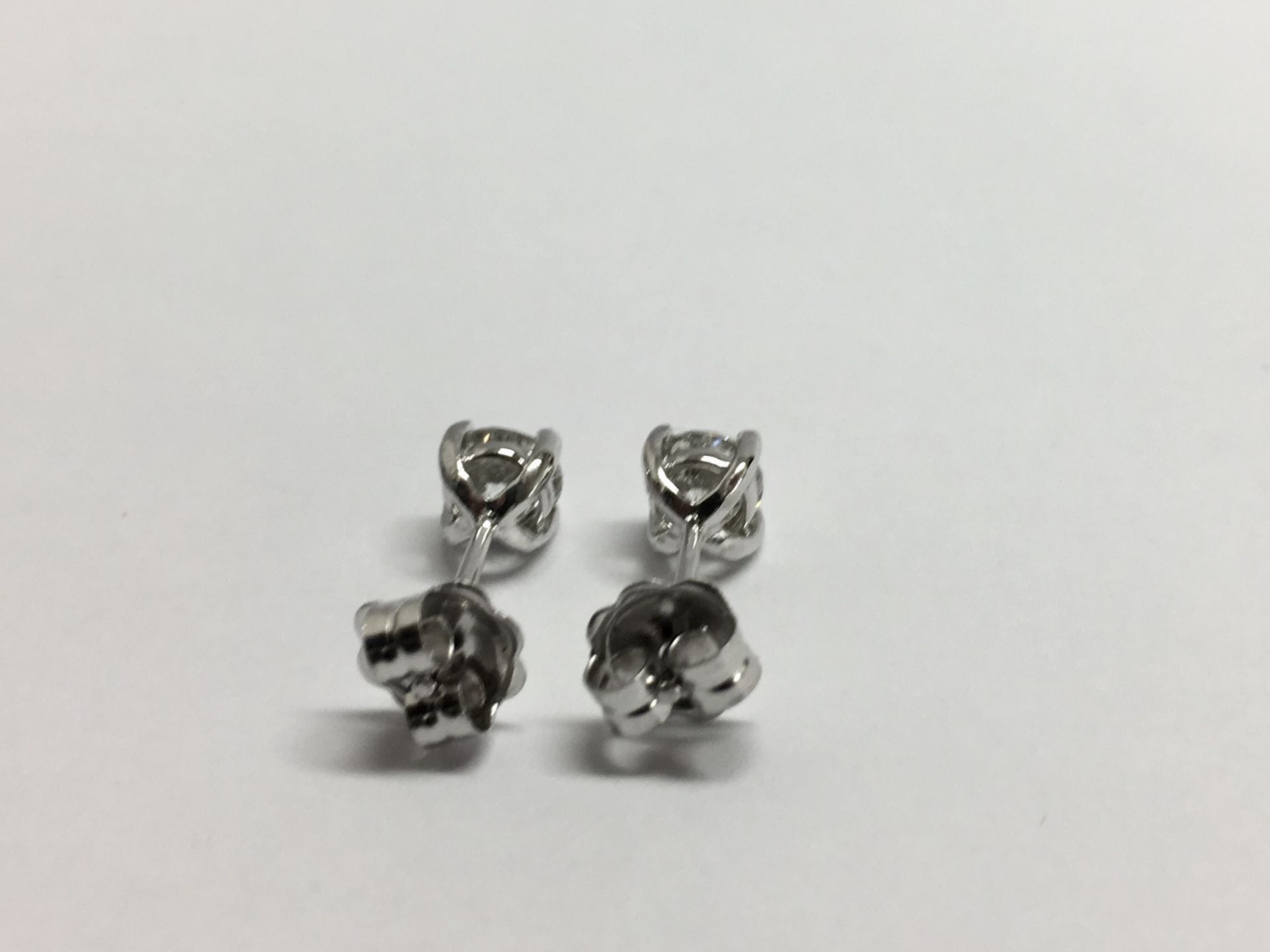 0.60ct Solitaire diamond stud earrings set with brilliant cut diamonds, SI2 clarity and I colour. - Bild 4 aus 4