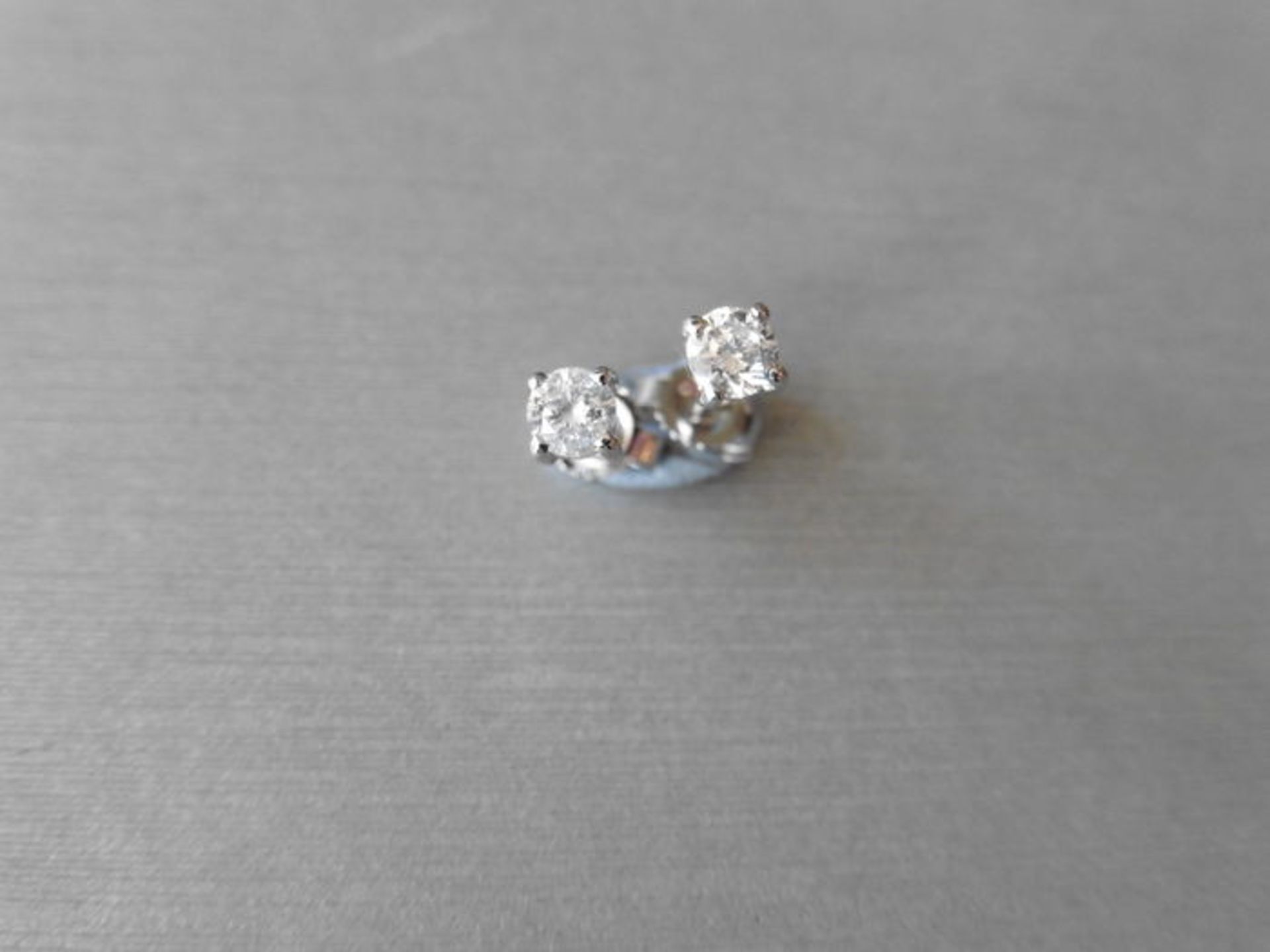 0.30ct diamond solitaire stud earrings set in platinum 950. Brilliant cut diamonds I colour, si2