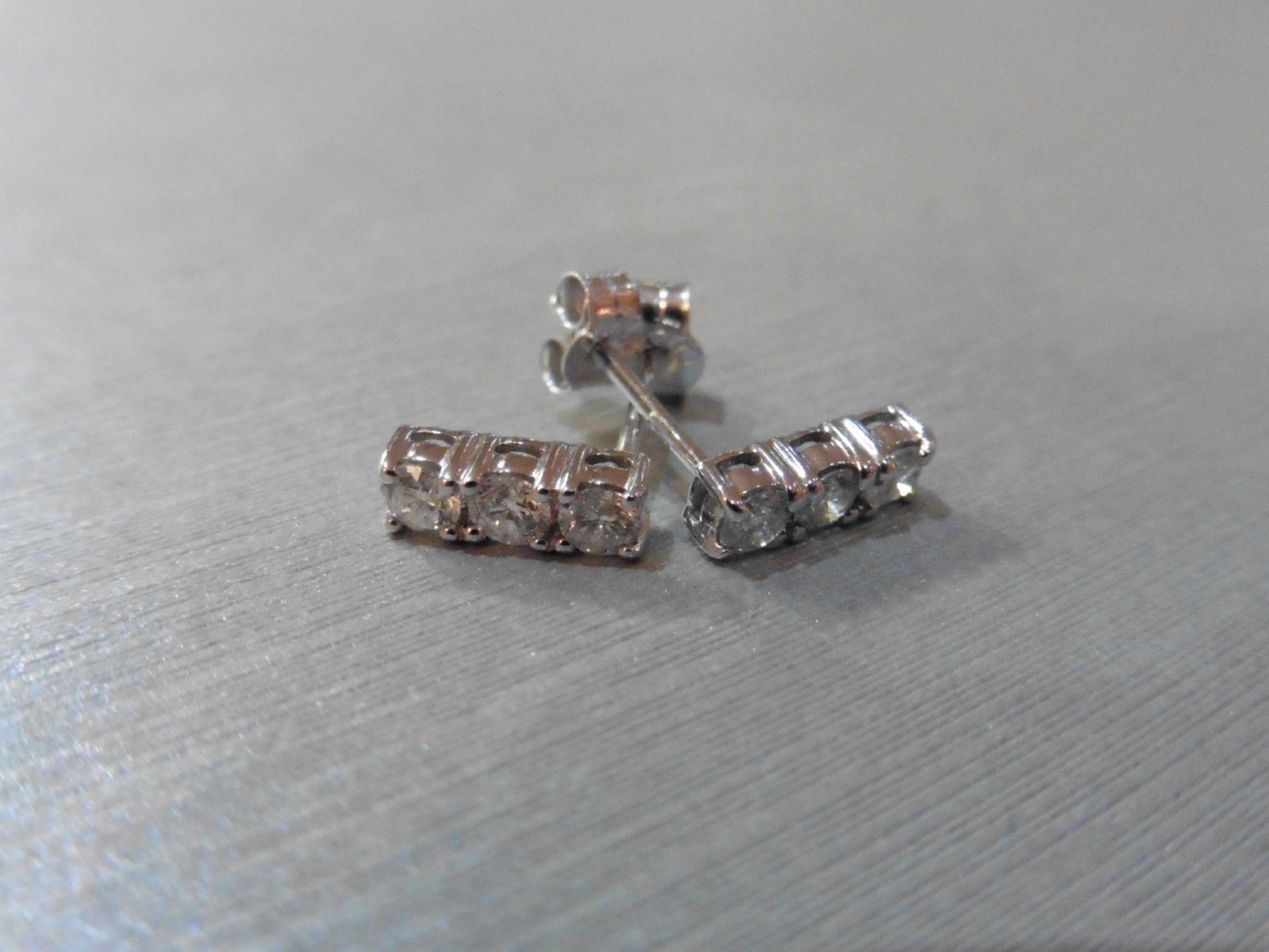 0.60ct trilogy drop earrings set in 18ct white gold.Brilliant cut diamonds, I colour and Si2-3 - Bild 3 aus 3