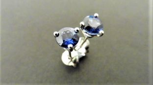 1ct solitaire stud style earrings set with round cut sapphires ( treated ) weighing approx 1.00ct. 3