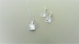 0.30ct / 0.50ct diamond pendant and earring set in platinum. Pendant - 0.30ct brilliant cut diamond,