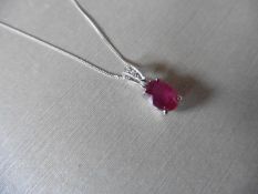 2.40ct ruby and diamond pendant with an 9x7mm oval cut ruby ( fracture treated ) and a diamond set