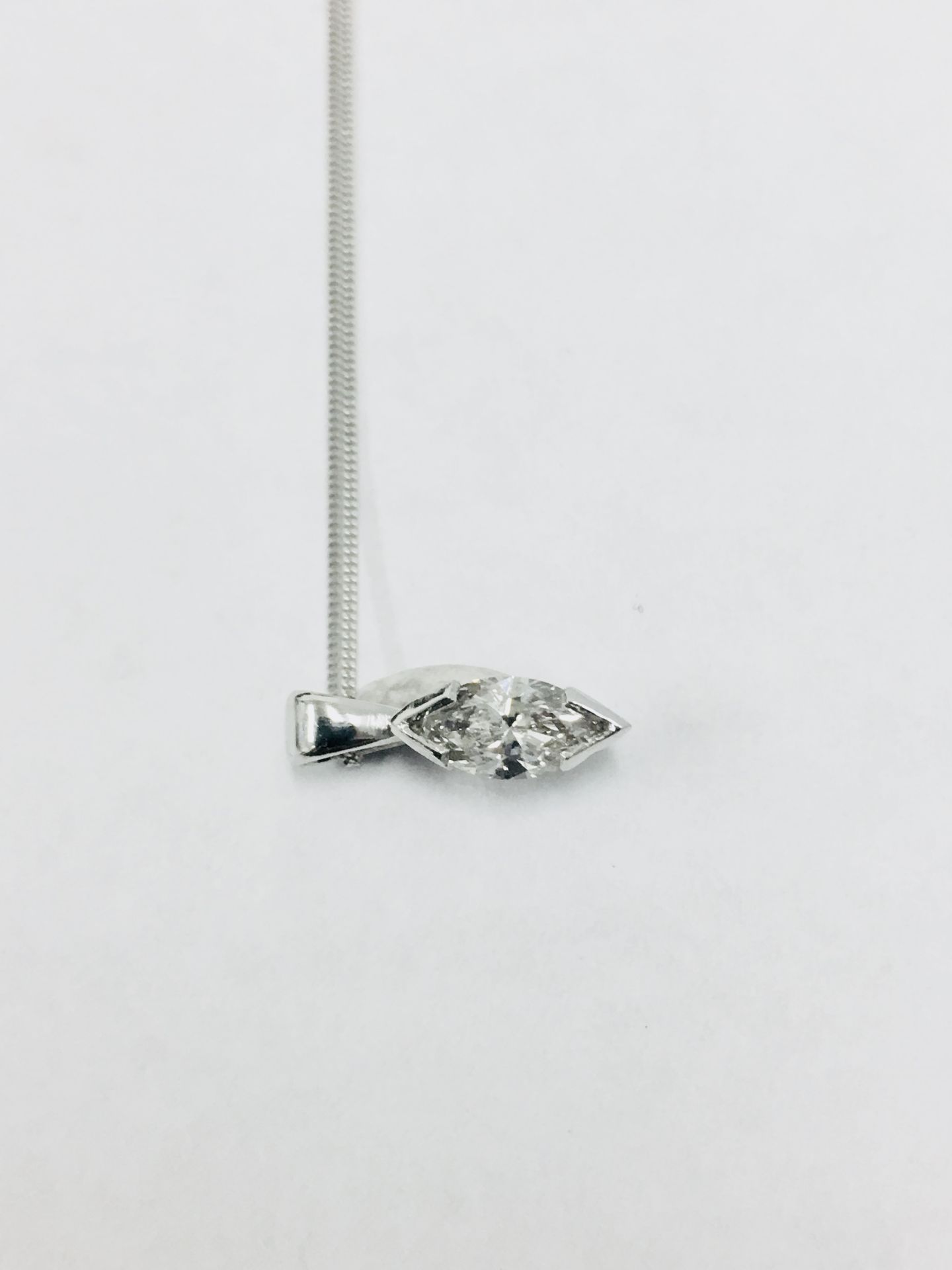 0.45ct diamond pendant with a marquise diamond. H colour and si1 clarity. 2 claw setting with - Image 3 of 3