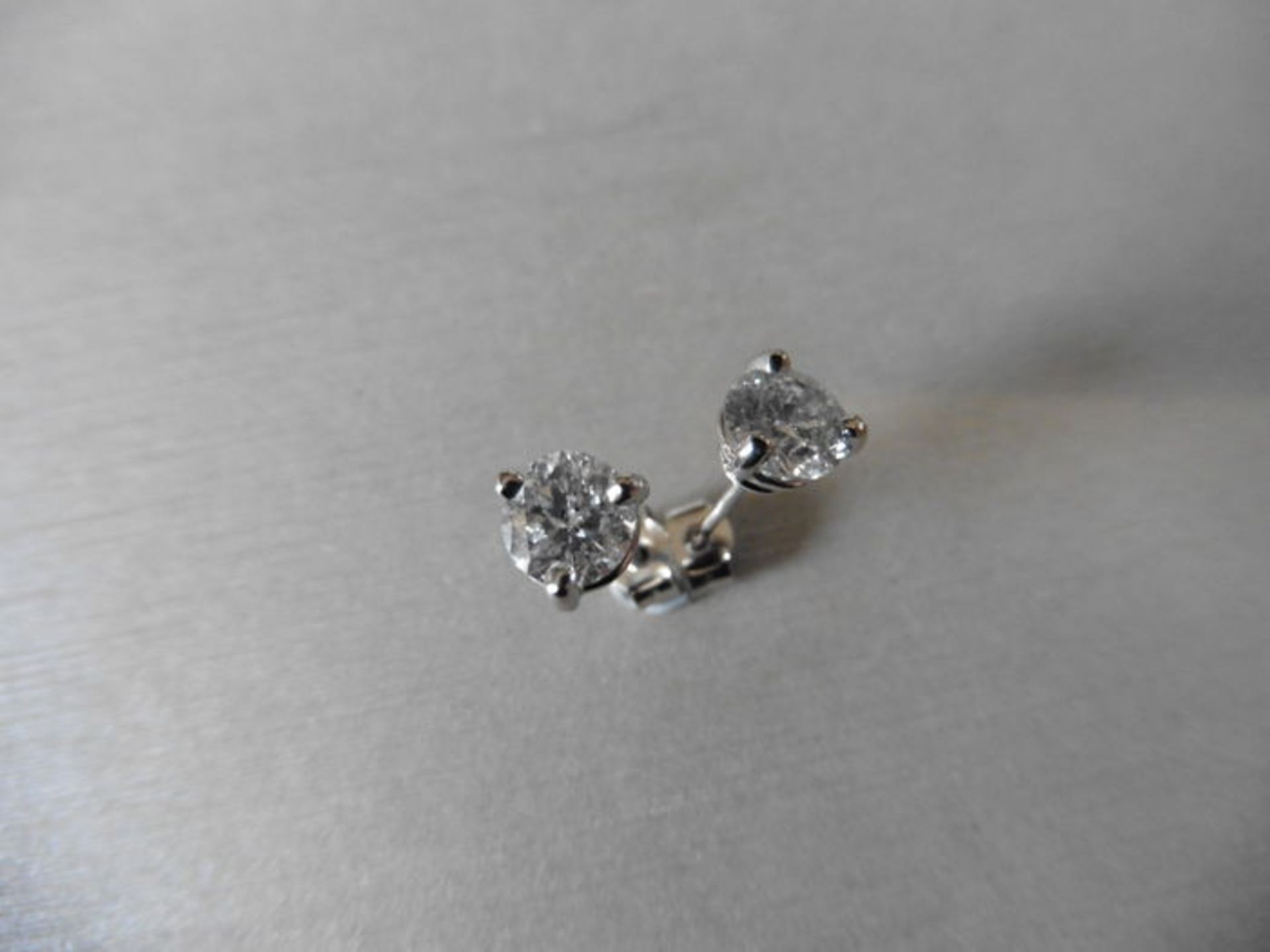 1.40ct diamond solitaire stud earrings set in platinum. I colour, I1-2 clarity. 3 claw setting