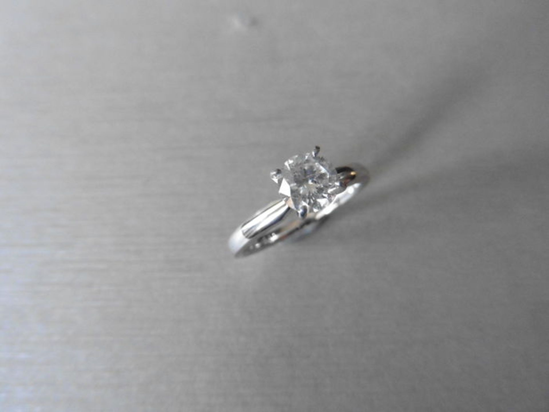 0.81ct diamond solitaire ring set in platinum. I colour, I1 clarity. 4 claw setting.Ring size N.