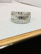 2.36ct diamond dressy ring,1.16ct brilliant cut,1.16ct emerald cut h colour si grade,9.89gms 18ct