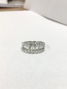 2.34ct diamond dress ring ,18ct white gold,11 taper diamonds 1.06ct,18 round brilliant cut
