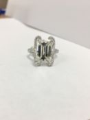 6ct Emerald cut diamond ring,H colour si clarity ,18ct white gold setting with 50x0.02ct round