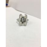 6ct Emerald cut diamond ring,H colour si clarity ,18ct white gold setting with 50x0.02ct round