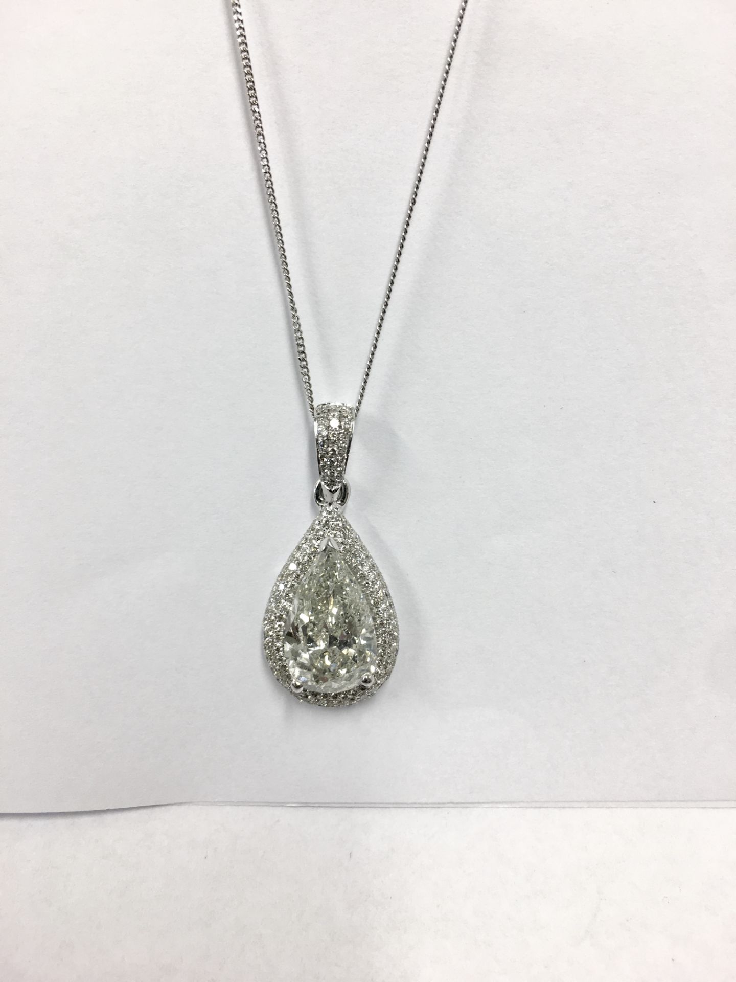 4.44ct pear shape diamond, k colour si3 clarity,18ct diamond set setting heavy ,UK hallmark