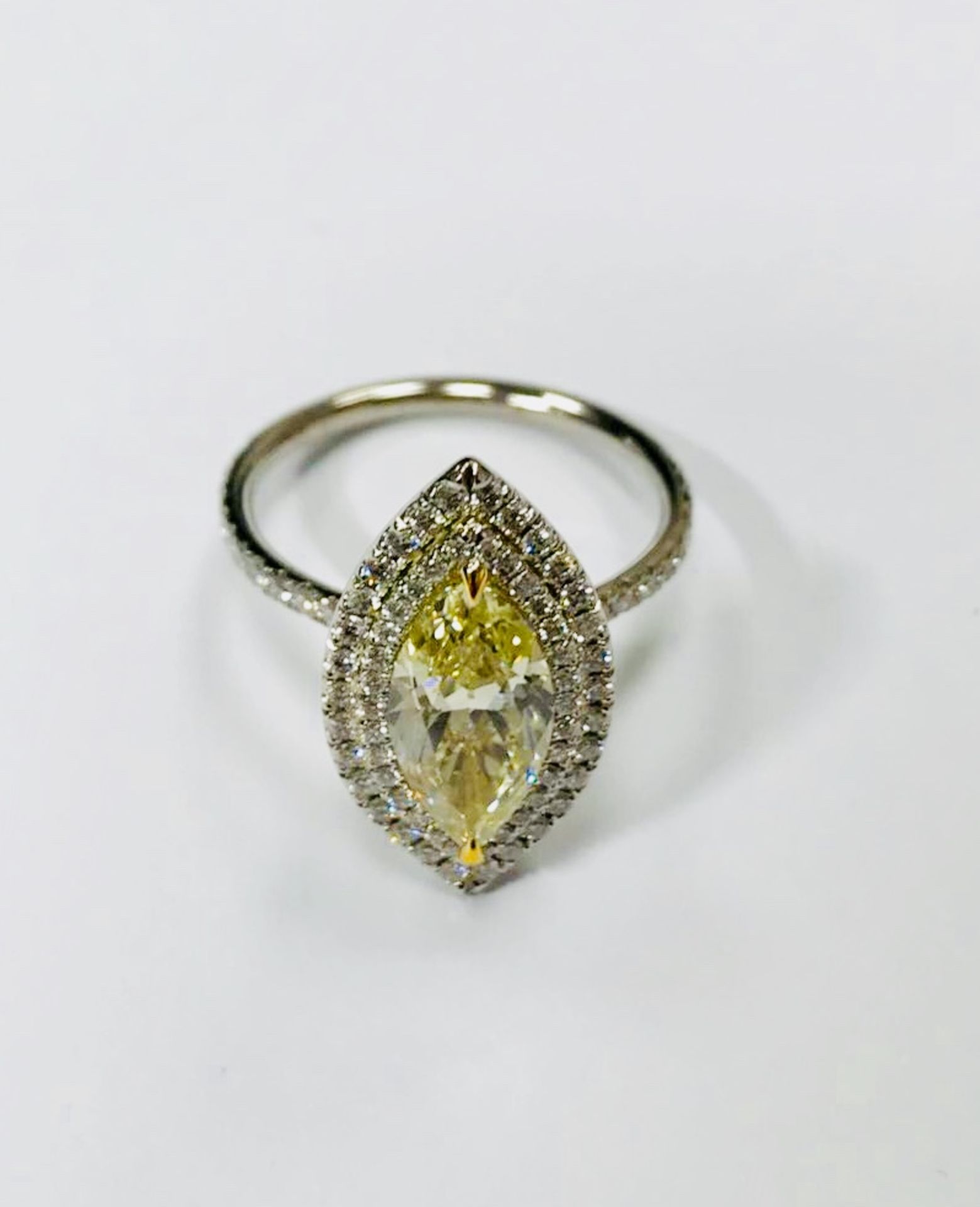 1.52ct fancy yellow Marquis cut diamond set in 18ct white gold ring,VS 2 clarity,WGI certification