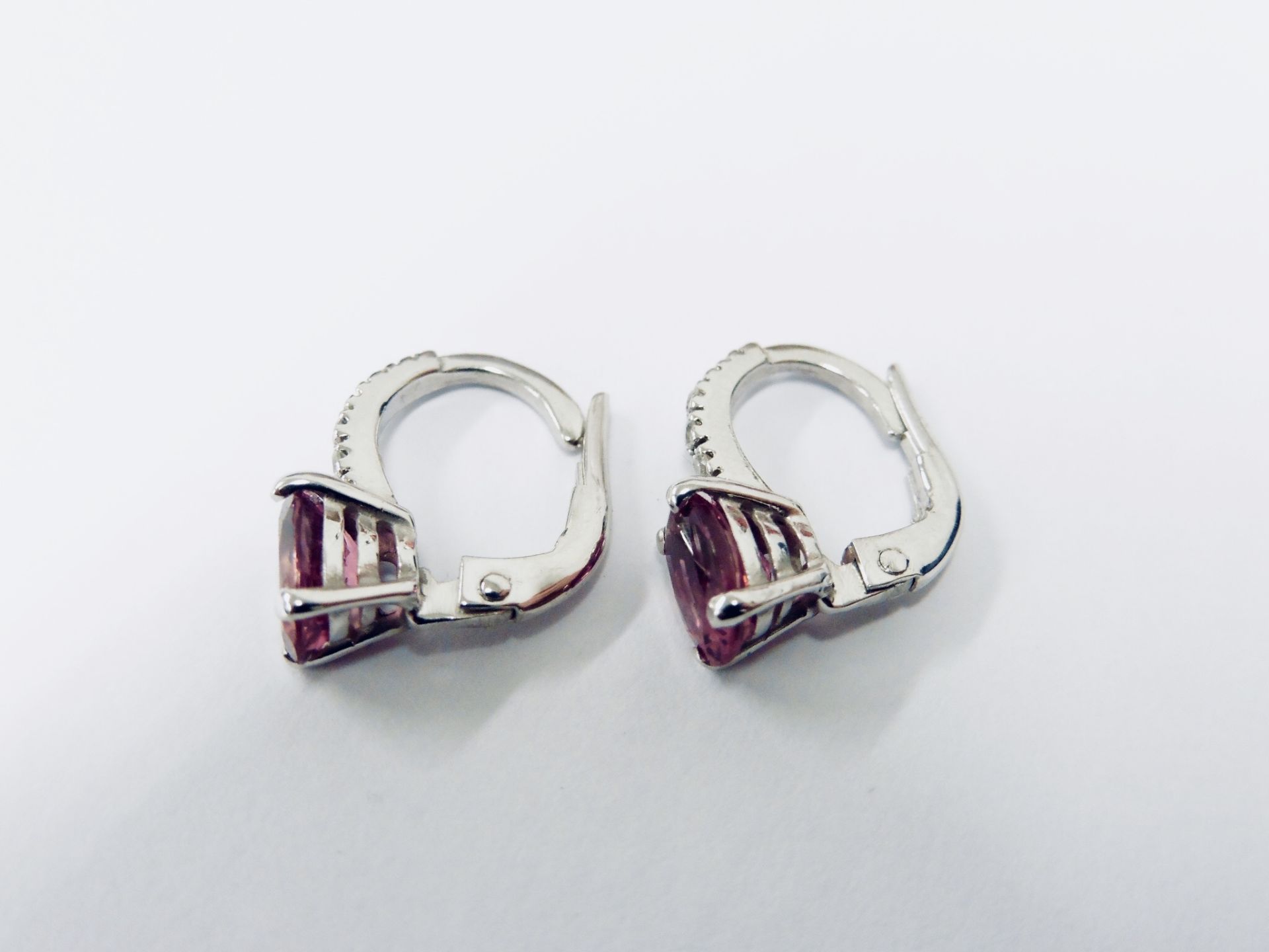 1.60ct Pink Tourmaline and diamond hoop style earrings. Each is set with a 7x 5mm oval cut - Image 4 of 4