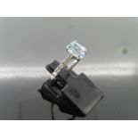 0.80ct / 0.12ct Aqua marine and diamond dress ring. Oval cut Aqua with small diamonds set into the