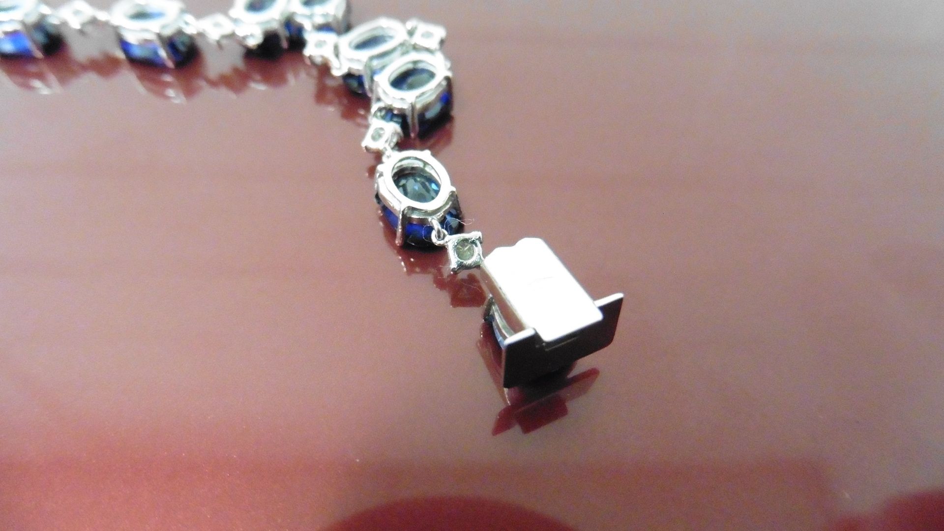 11ct sapphire and diamond bracelet.Set with oval ( treated ) sapphires and small brilliant cut - Image 2 of 5