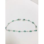 6ct emerald and diamond bracelet.Set with emerald cut ( treated ) emeralds and small brilliant cut