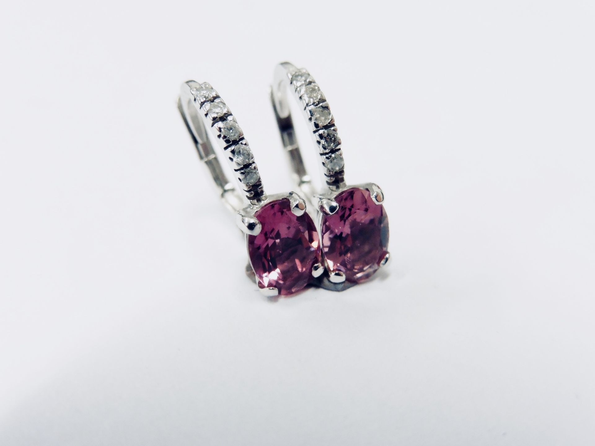 1.60ct Pink Tourmaline and diamond hoop style earrings. Each is set with a 7x 5mm oval cut - Image 2 of 4