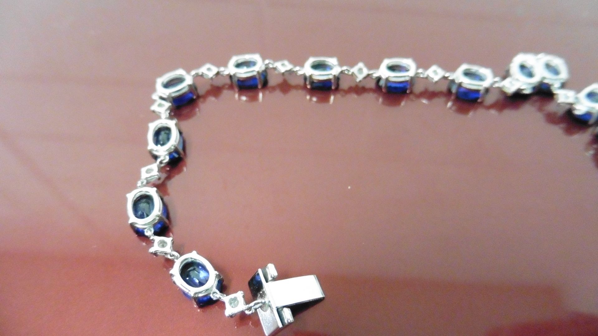 11ct sapphire and diamond bracelet.Set with oval ( treated ) sapphires and small brilliant cut - Image 3 of 5