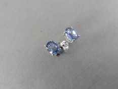 0.60ct ceylon sapphire stud style earrings set in 9ct white gold. 5 x 4mm oval cut sapphires set