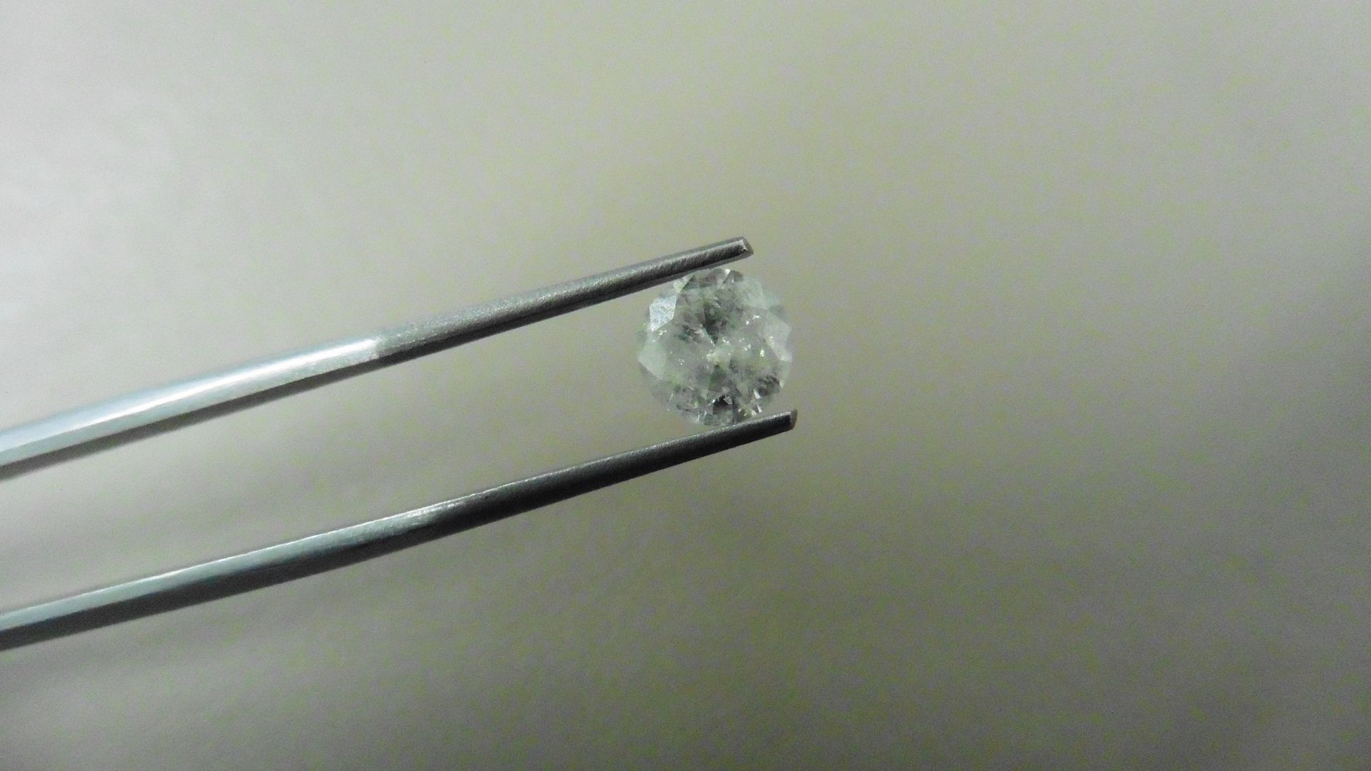 1.01ct Brilliant Cut Diamond, Enhanced stone. H colour, I2 clarity. 6.44 x 3.79mm. Valued at £1490 - Image 2 of 5