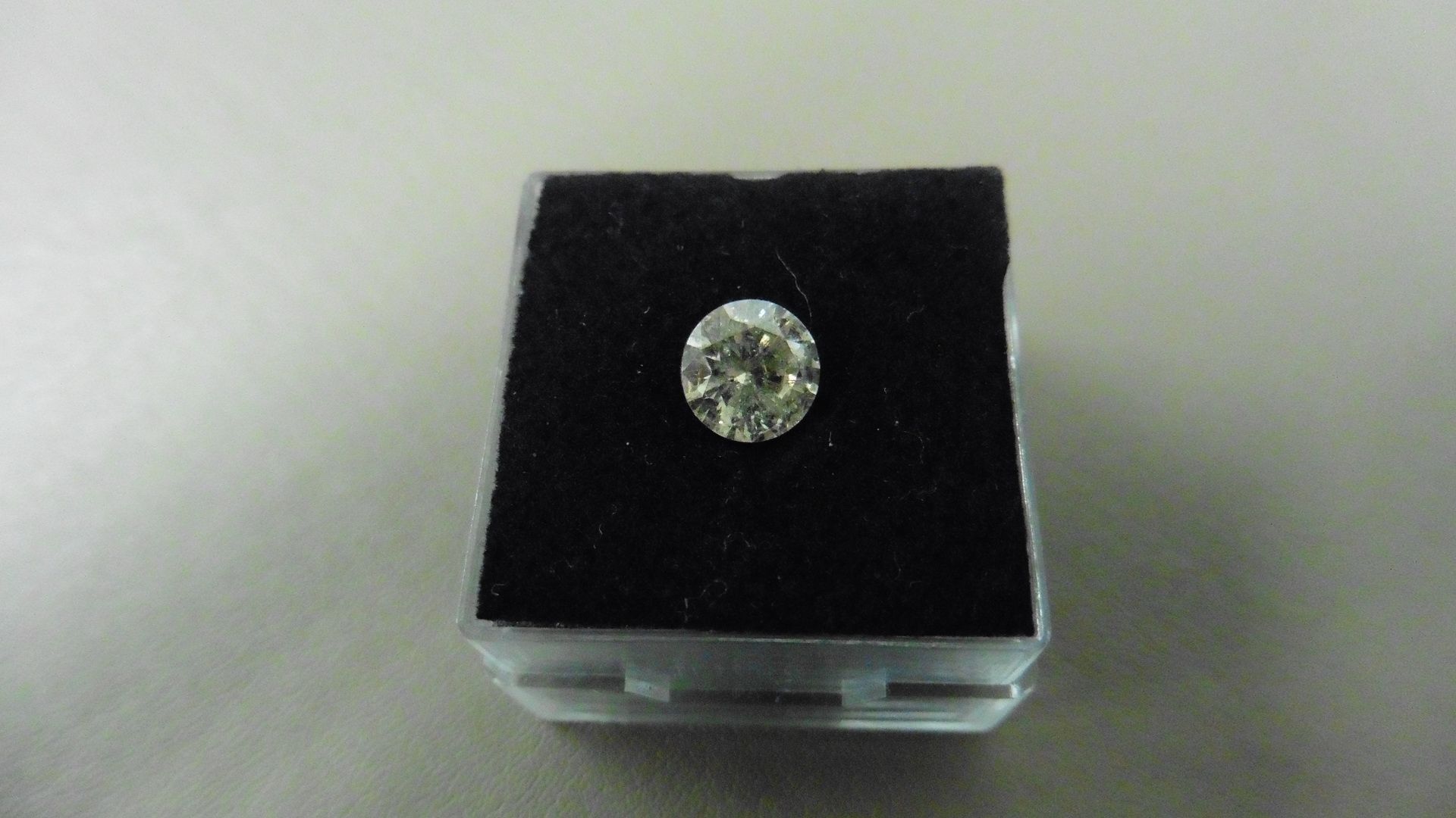 1.12ct Brilliant Cut Diamond, Enhanced stone. K colour, I1 clarity. 6.72 x 3.90mm. Valued at £1490 - Image 4 of 4