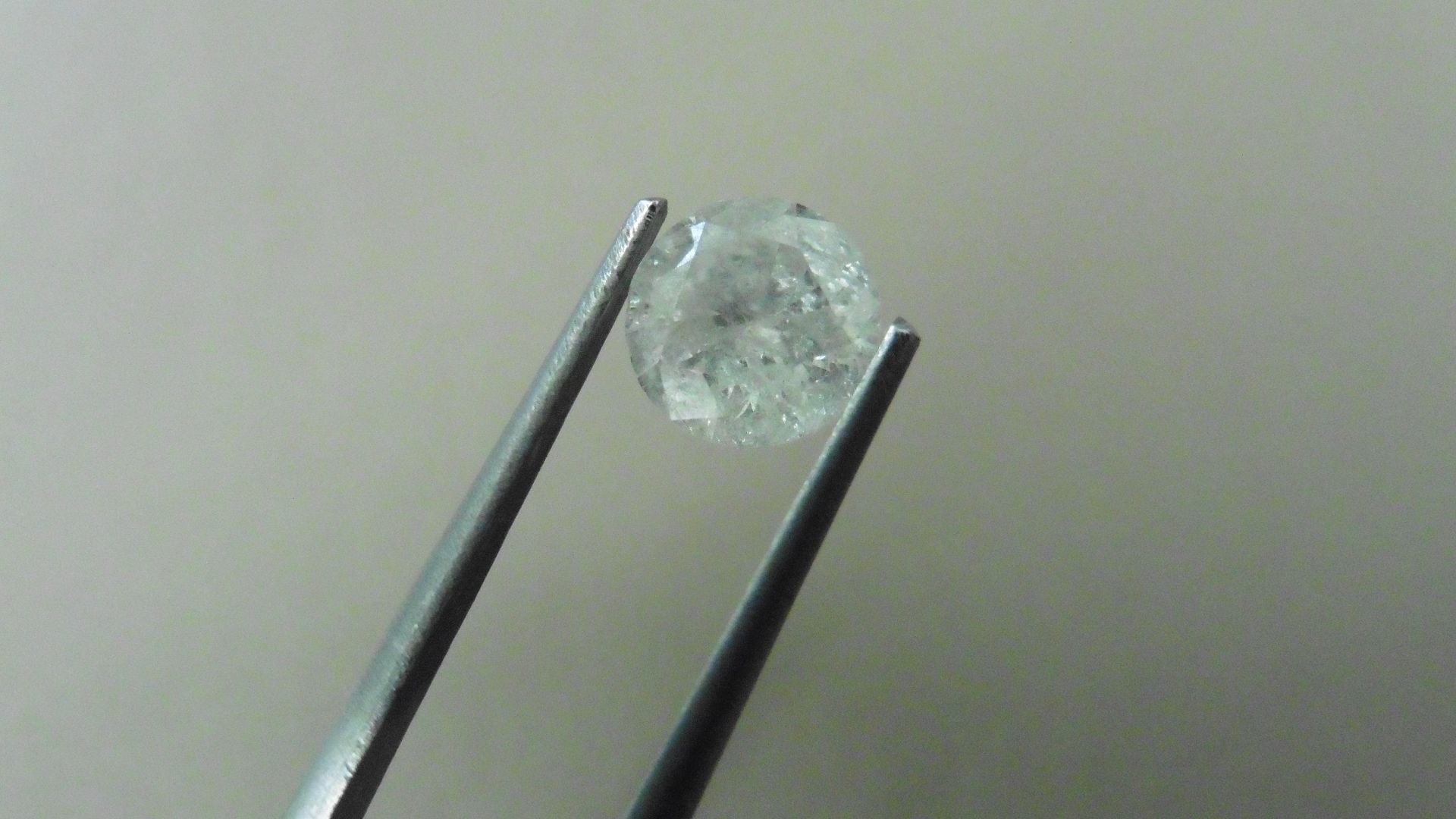 1.25ct Brilliant Cut Diamond, Enhanced stone.G/H colour, I2 clarity. 6.91 x 3.98mm. Valued at £2250