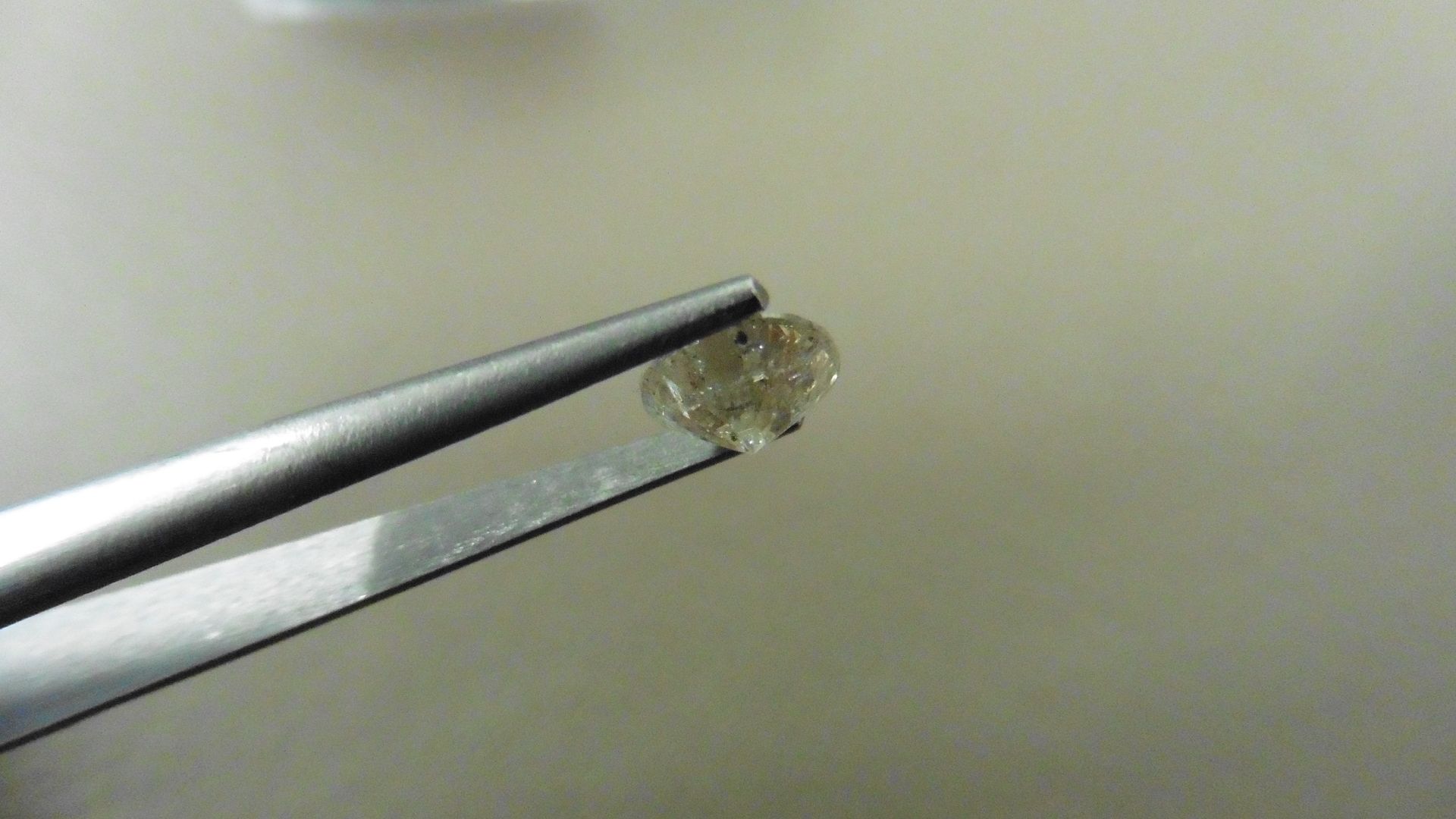 1.12ct Brilliant Cut Diamond, Enhanced stone. K colour, I1 clarity. 6.72 x 3.90mm. Valued at £1490 - Image 3 of 4