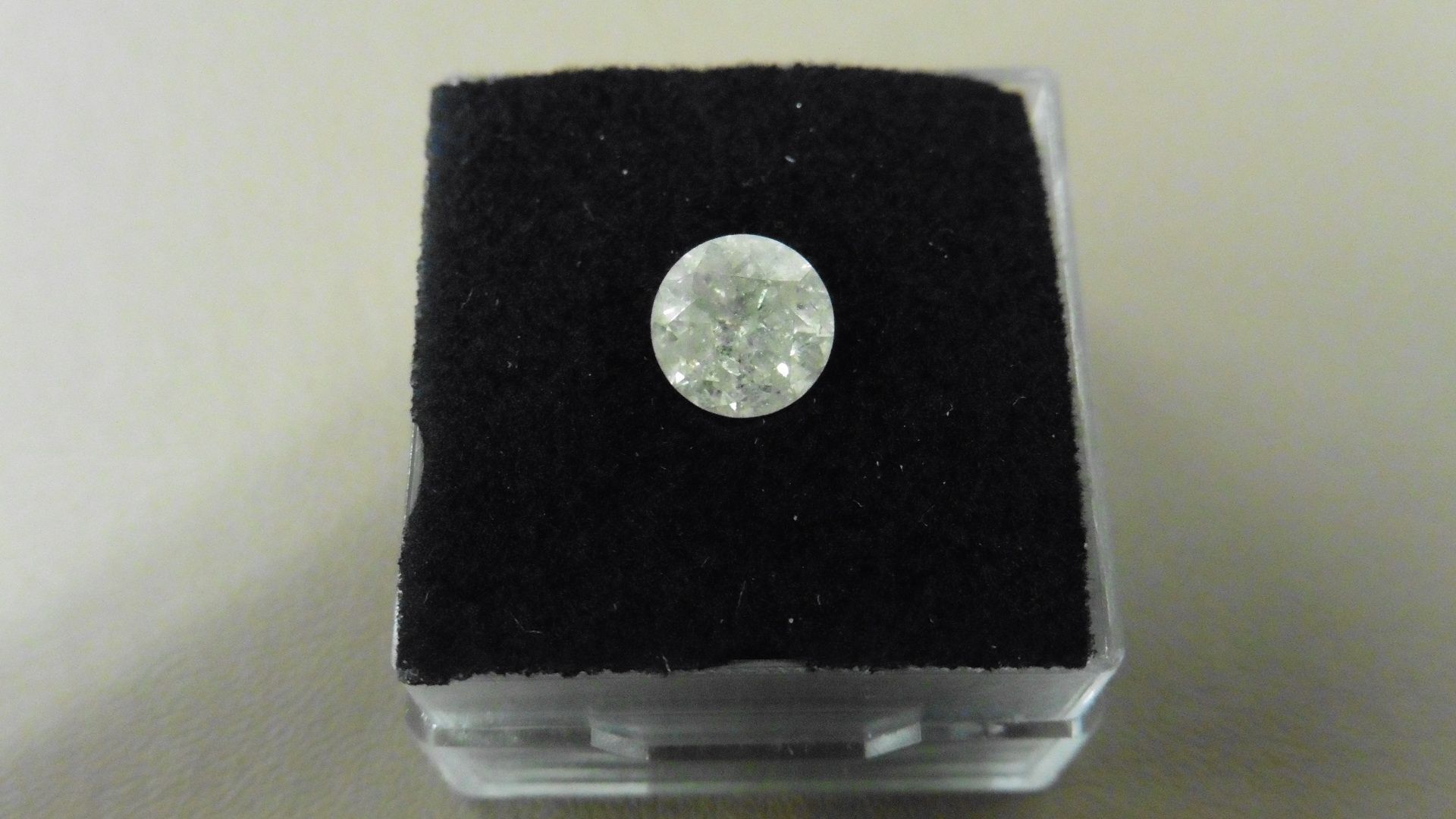 1.37ct Brilliant Cut Diamond, Enhanced stone. I colour, I2 clarity. 6.91 x 4.30mm. Valued at £2500 - Image 4 of 4