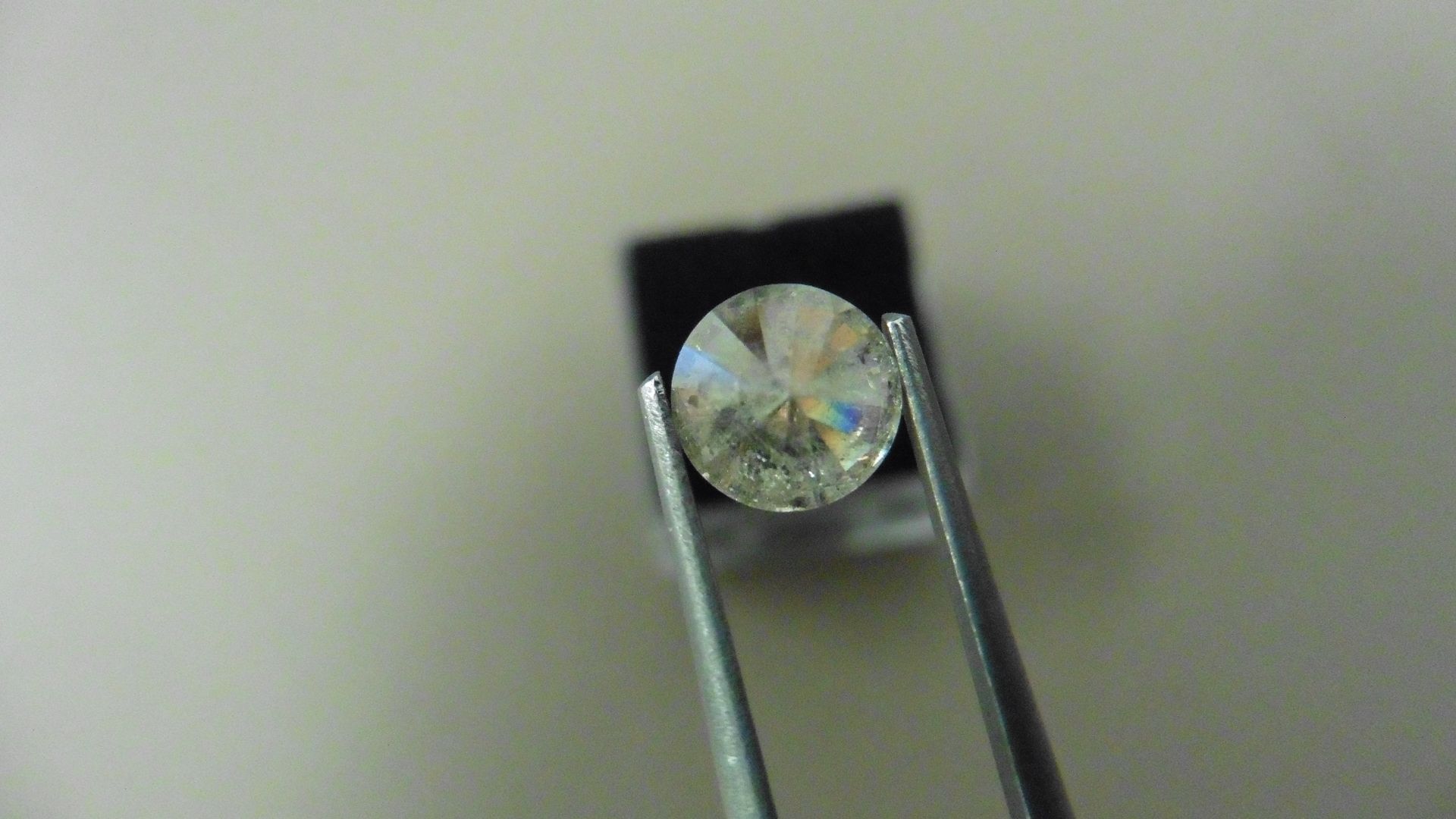 1.12ct Brilliant Cut Diamond, Enhanced stone. K colour, I1 clarity. 6.72 x 3.90mm. Valued at £1490 - Image 2 of 4